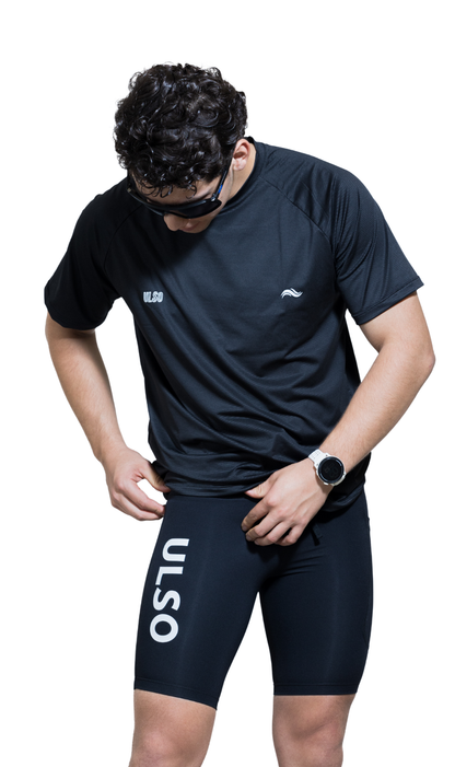 SHORT HOMBRE PERFORMANCE NEGRO - 6 BOLSILLOS